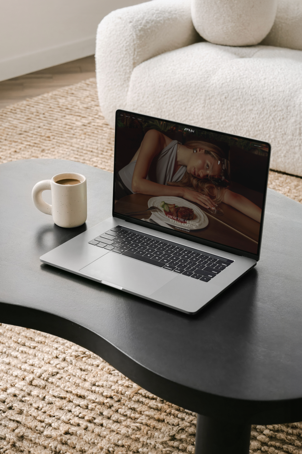 Finn restaurant website shown on a MacBook, by Dweb Studio