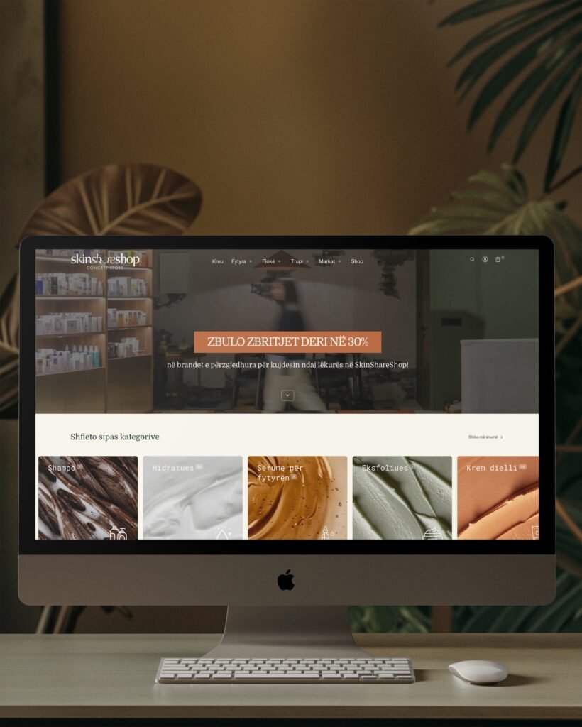 SkinShare Shop – Shopify store homepage shown on an iMac, built by Dweb Studio