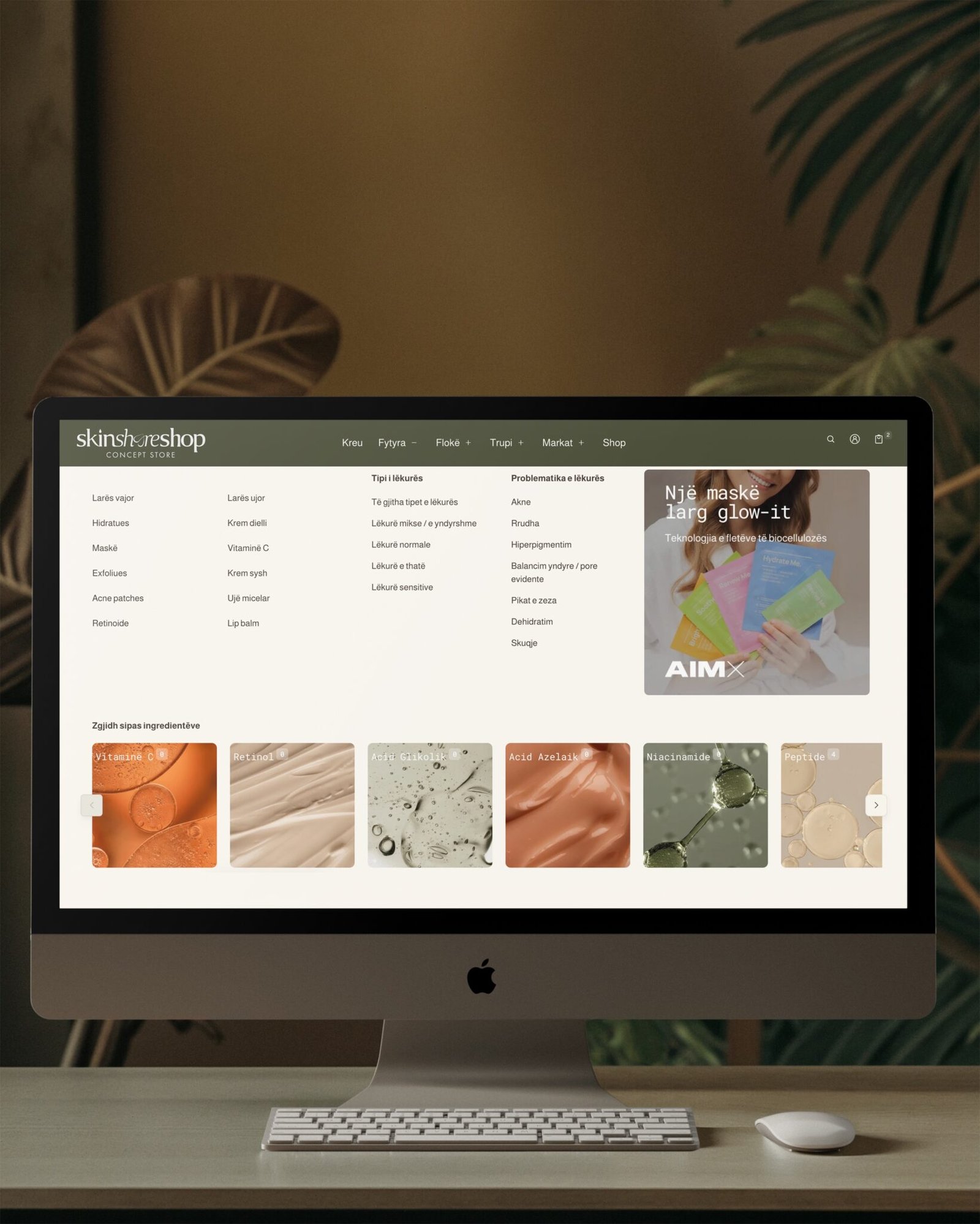 SkinShare Shop – mega menu and shop-by-ingredient navigation shown on an iMac